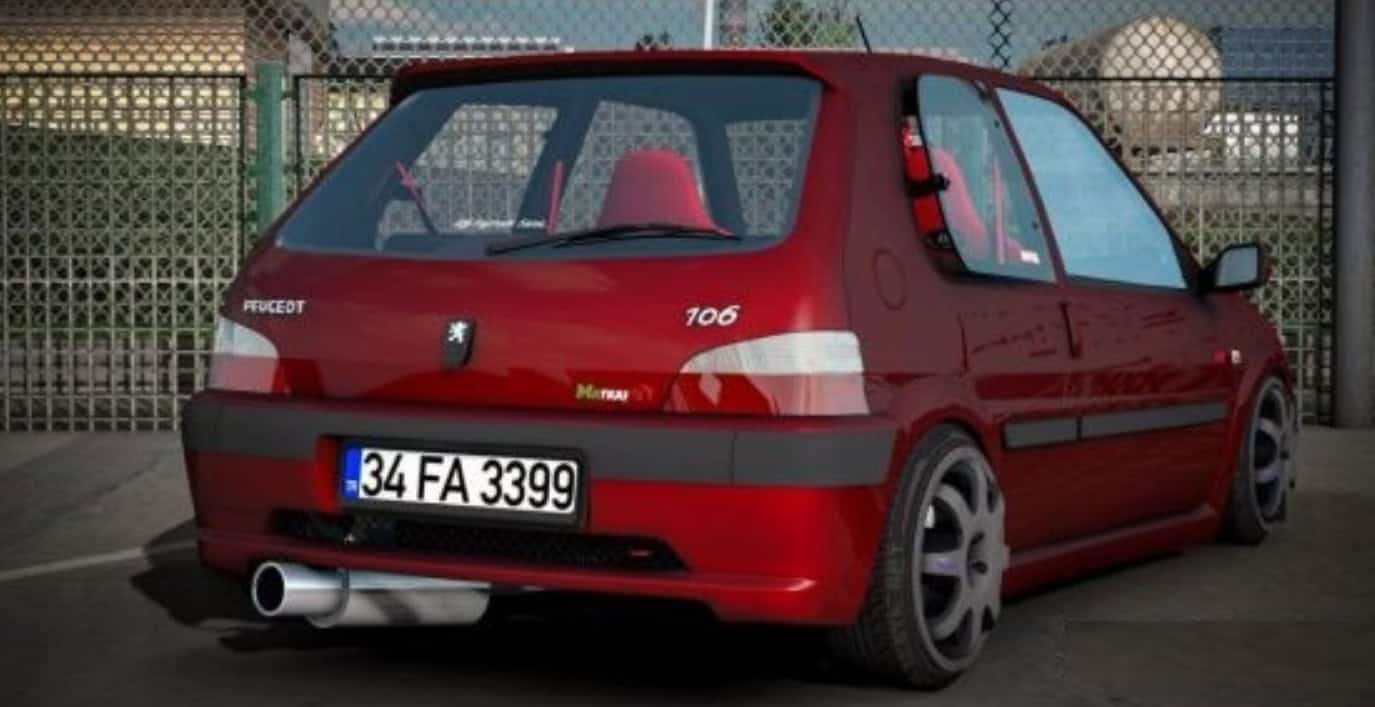 Interior detalhado do Peugeot 106 com volante esportivo
